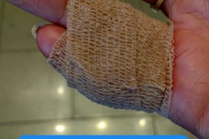 Bandaged_Pinkie_Finger